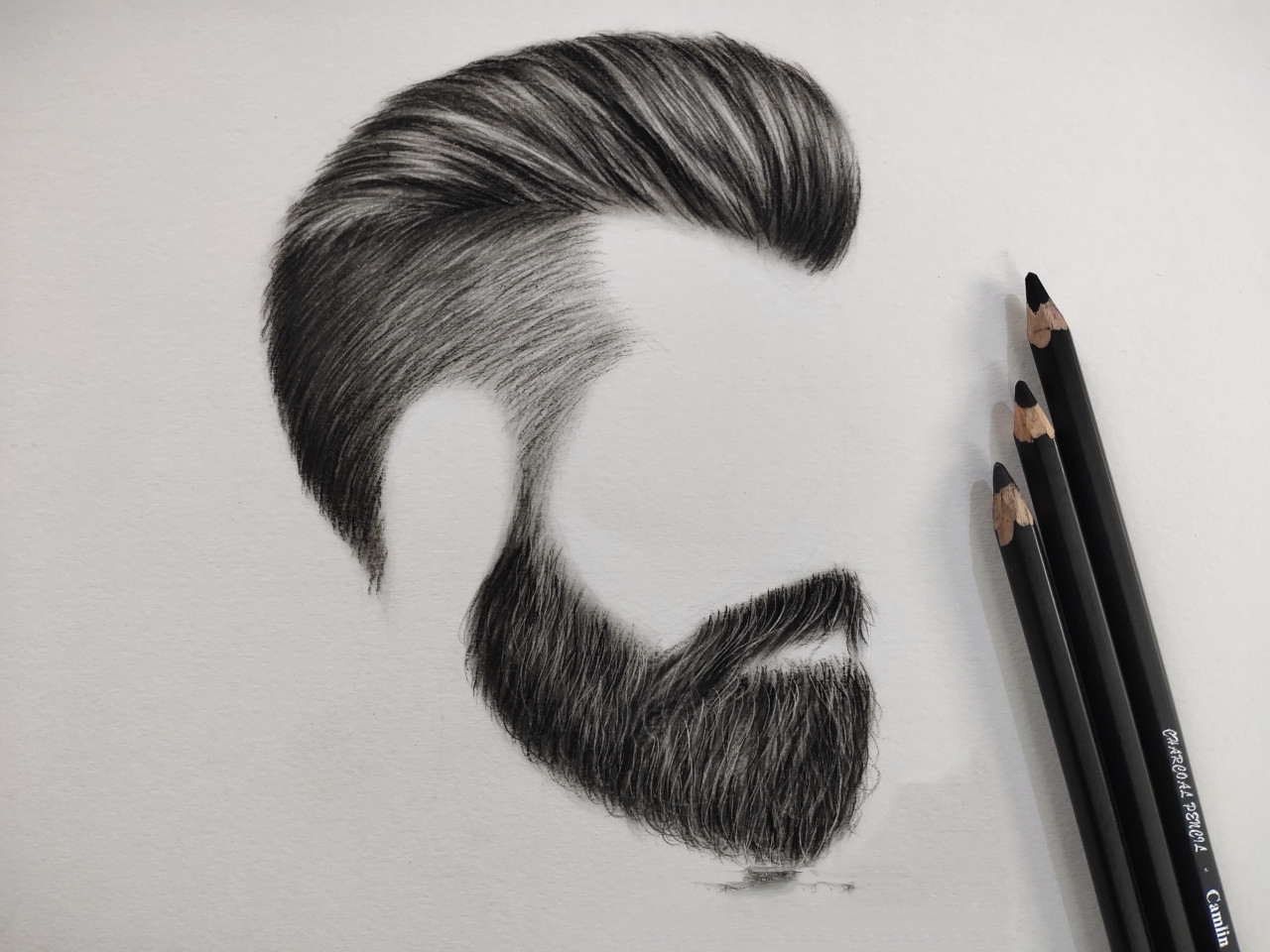 Detailed hair and beard charcoal study